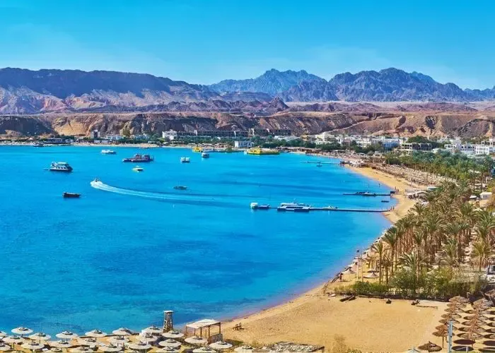 A photo of Sharm El Sheikh coastline with mountains in the background